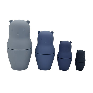 4 silicone bears each a different shade of blue from left to right tallest to shortest