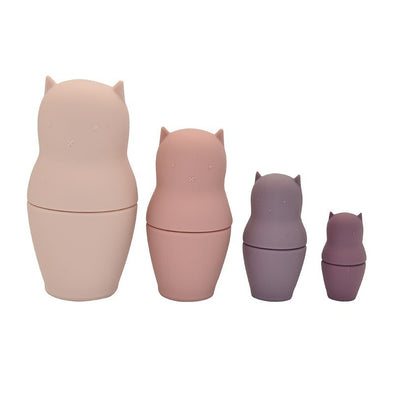 One Set of cat nesting dolls. 4 dolls next to each other. White background. 