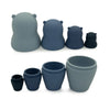 4 silicone bears each a different shade of blue each open for stacking