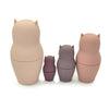One Set of cat nesting dolls. 4 dolls next to each other. White background. 